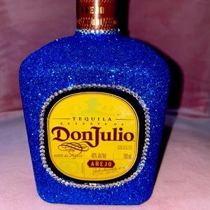 Empty Don Julio añejo bedazzled bottle